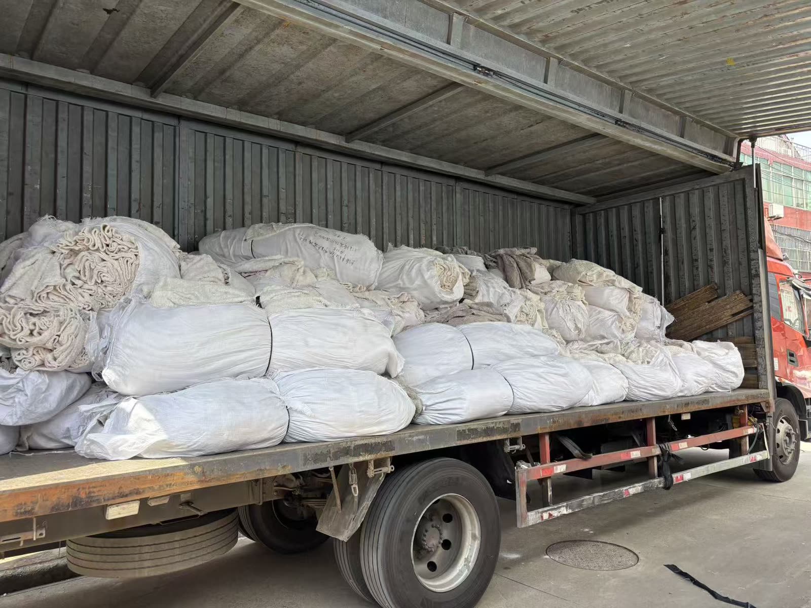 Inspected fabric loaded on a truck for the garment factory